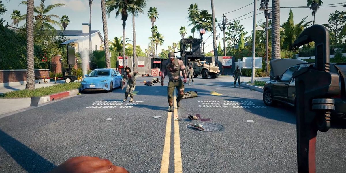 Dead Island 2 player standing opposite zombie on road