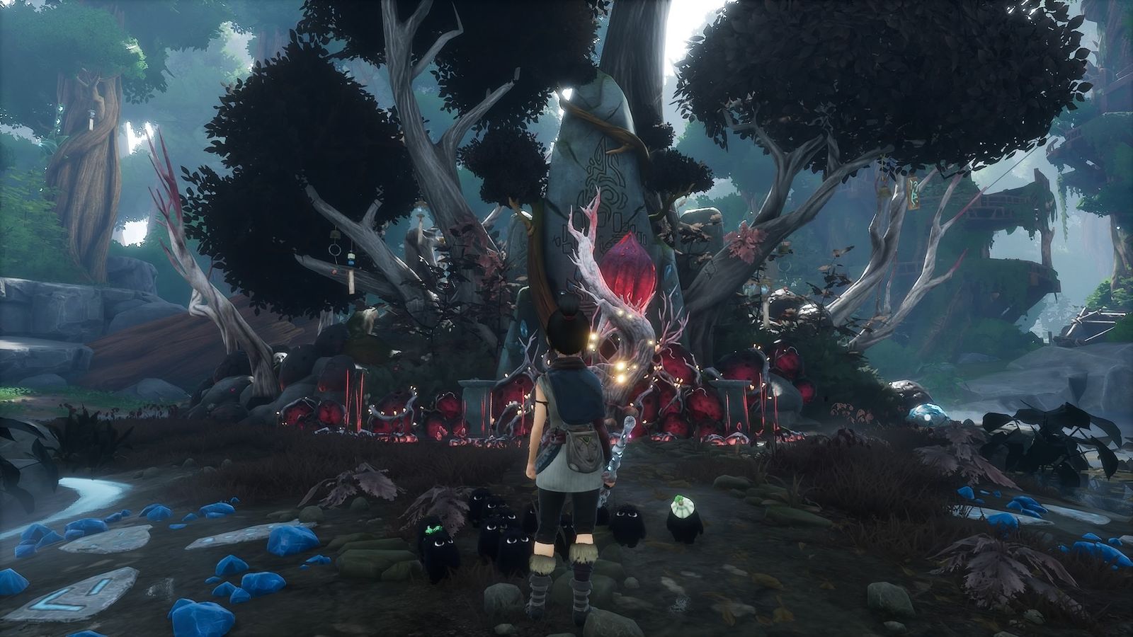 Kena in front of the infected Water Shrine.