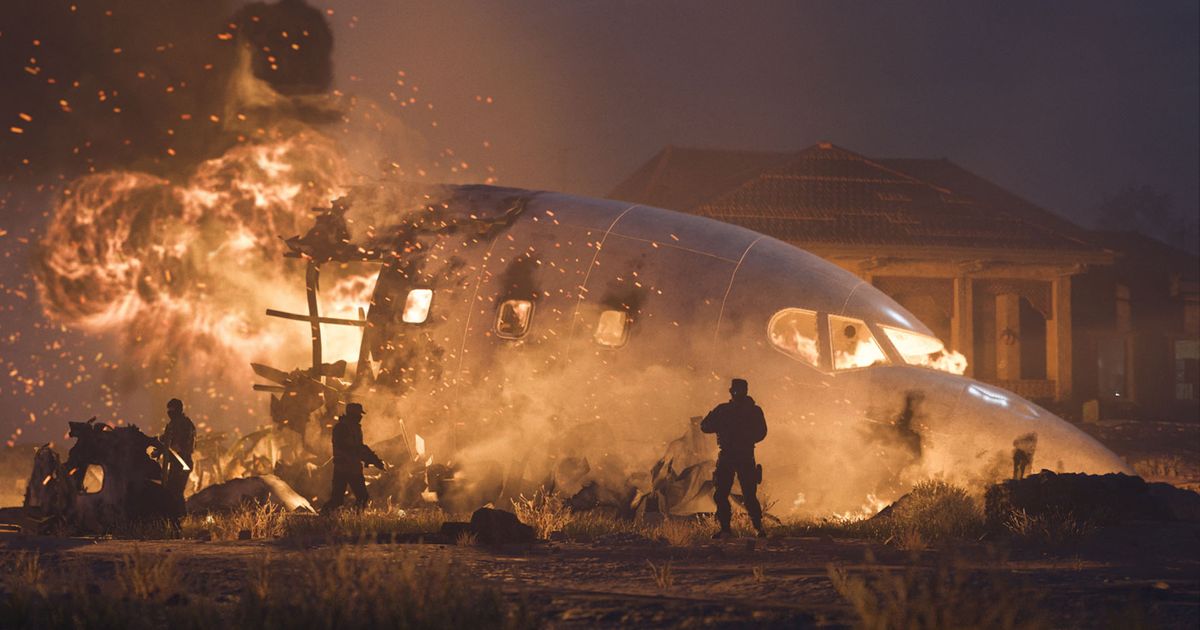 Modern Warfare 3 burning aeroplane fuselage surrounded by Konni Group soldiers