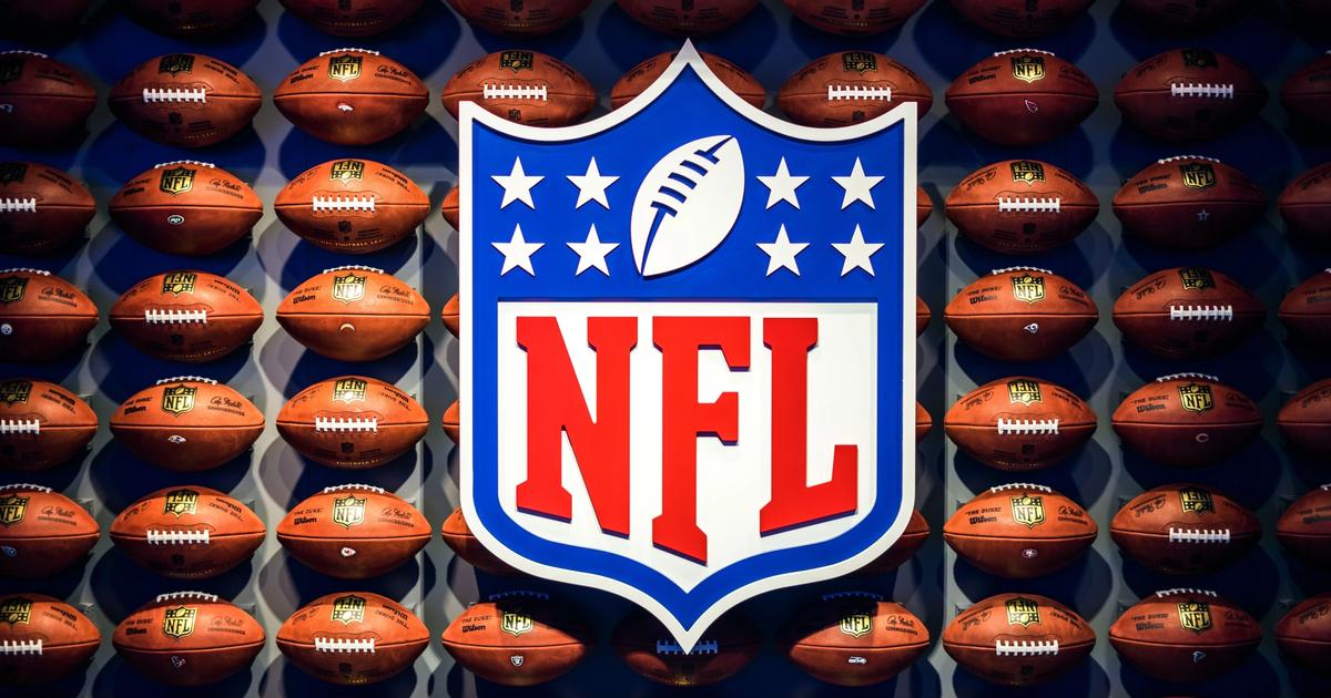 NFL logo displayed between rugby balls