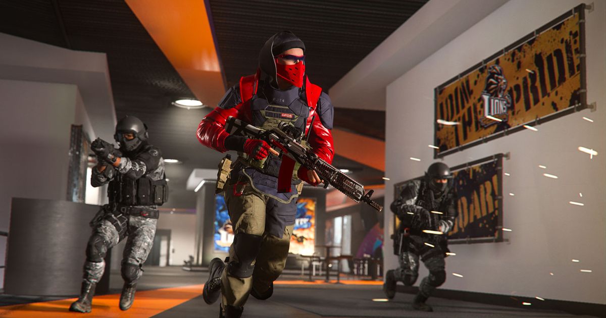 Screenshot of Warzone players running through a corridor carrying guns