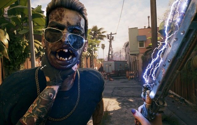 Screenshot of Dead Island 2 player strangling zombie and holding electric sword