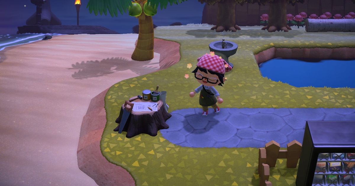 A player standing next to a workbench for crafting in Animal Crossing: New Horizons.