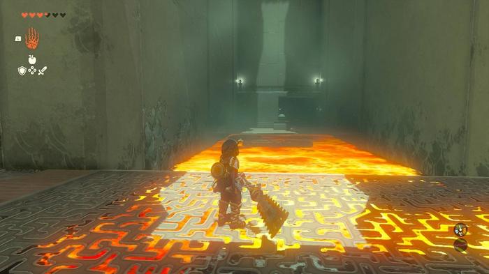 Link riding across lava in the Timawak Shrine in Zelda Tears of the Kingdom.