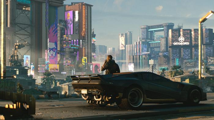 A man is standing, leaning against his car. He is also thinking about how the state of the game should be on launch.