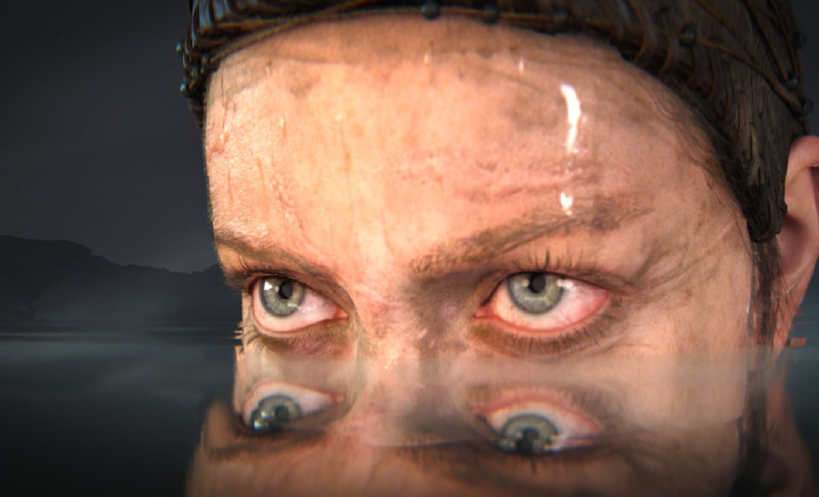 a close up of a Senua's face in Hellblade 2 reflected in a large body of water