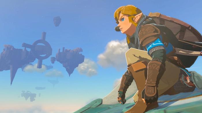 Link perched on a glider in Zelda Tears of the Kingdom.