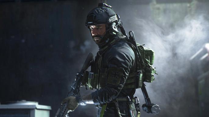 Image showing Modern Warfare 2 player holding gun on black background