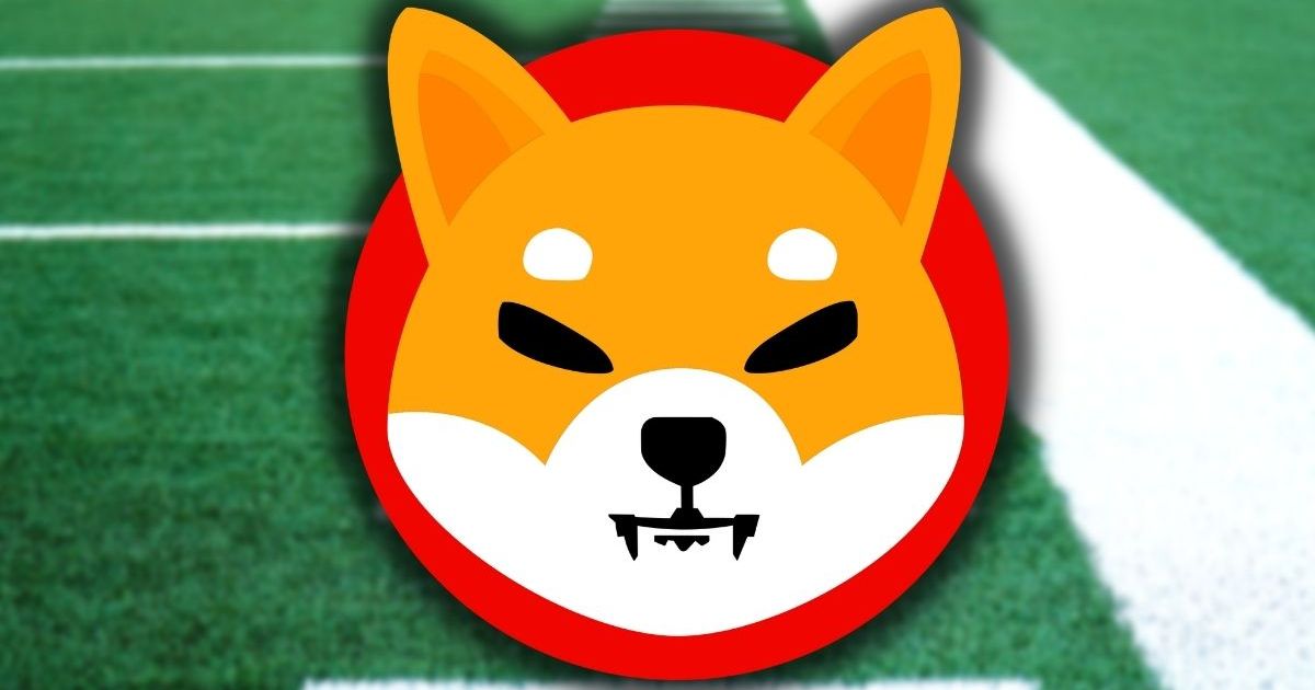 Shiba Inu logo on football pitch.