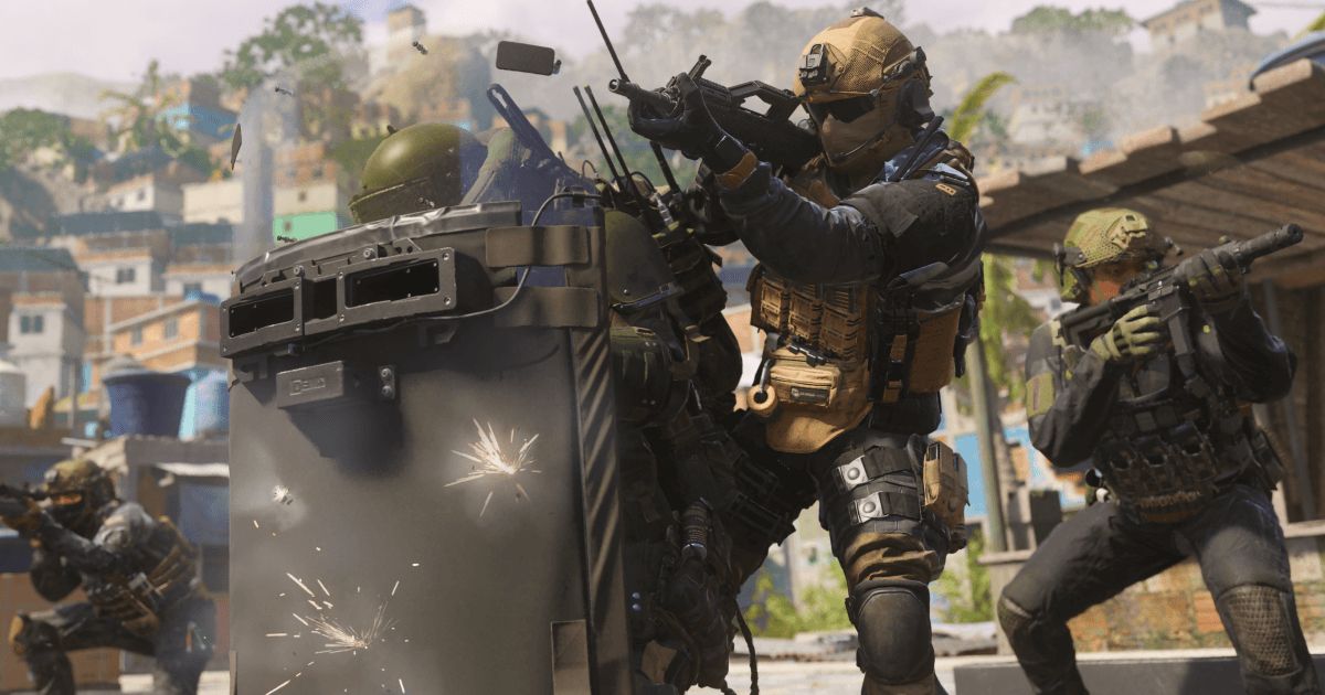 An armoured soldier in Modern Warfare 3 shooting a weapon behind another solider holding a riot shield.