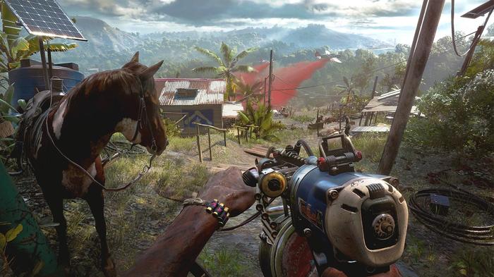 Dani looks down over a village in Far Cry 6. A horse can be seen on the left side of the image.
