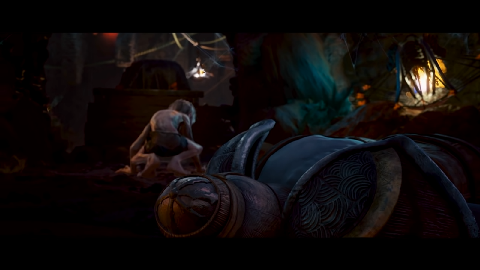 Gollum game image showing Gollum sitting near dead Orc.