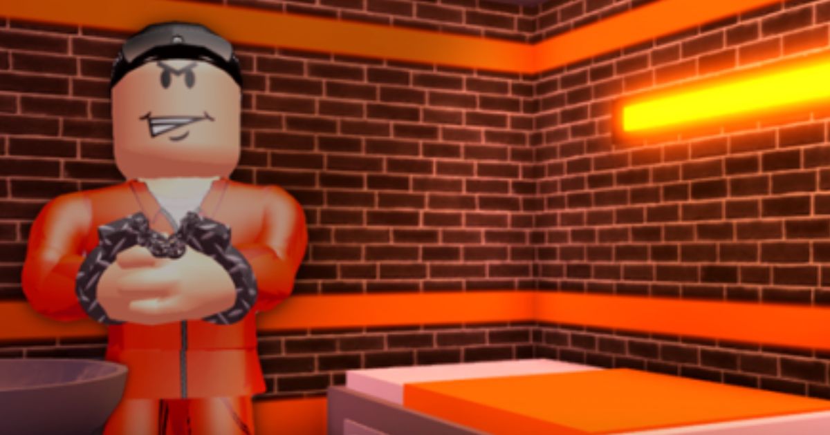 Screenshot from Jailbreak, with an grinning criminal in handcuffs in their cell