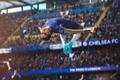 EA Sports FC 24 Sam Kerr backflipping with stadium crowd in background