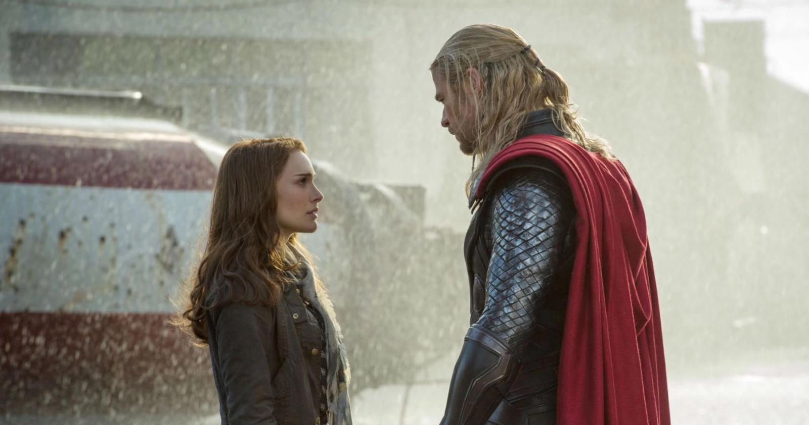 Thor and Jane Foster are looking at each other in the rain.