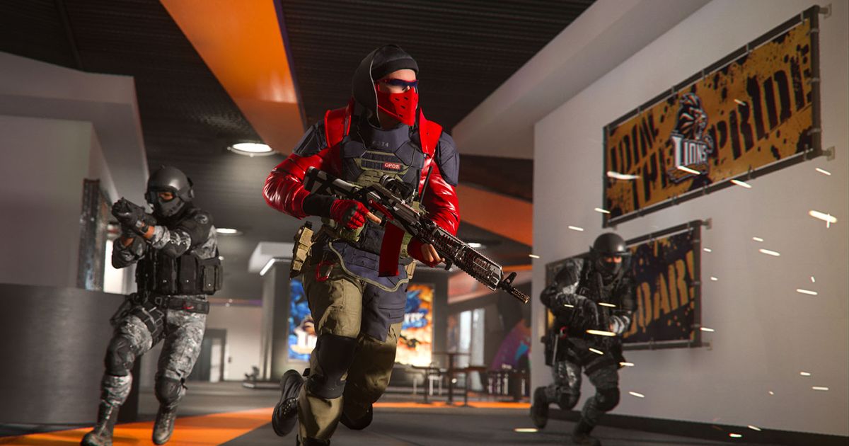 Screenshot of Warzone players running through a building