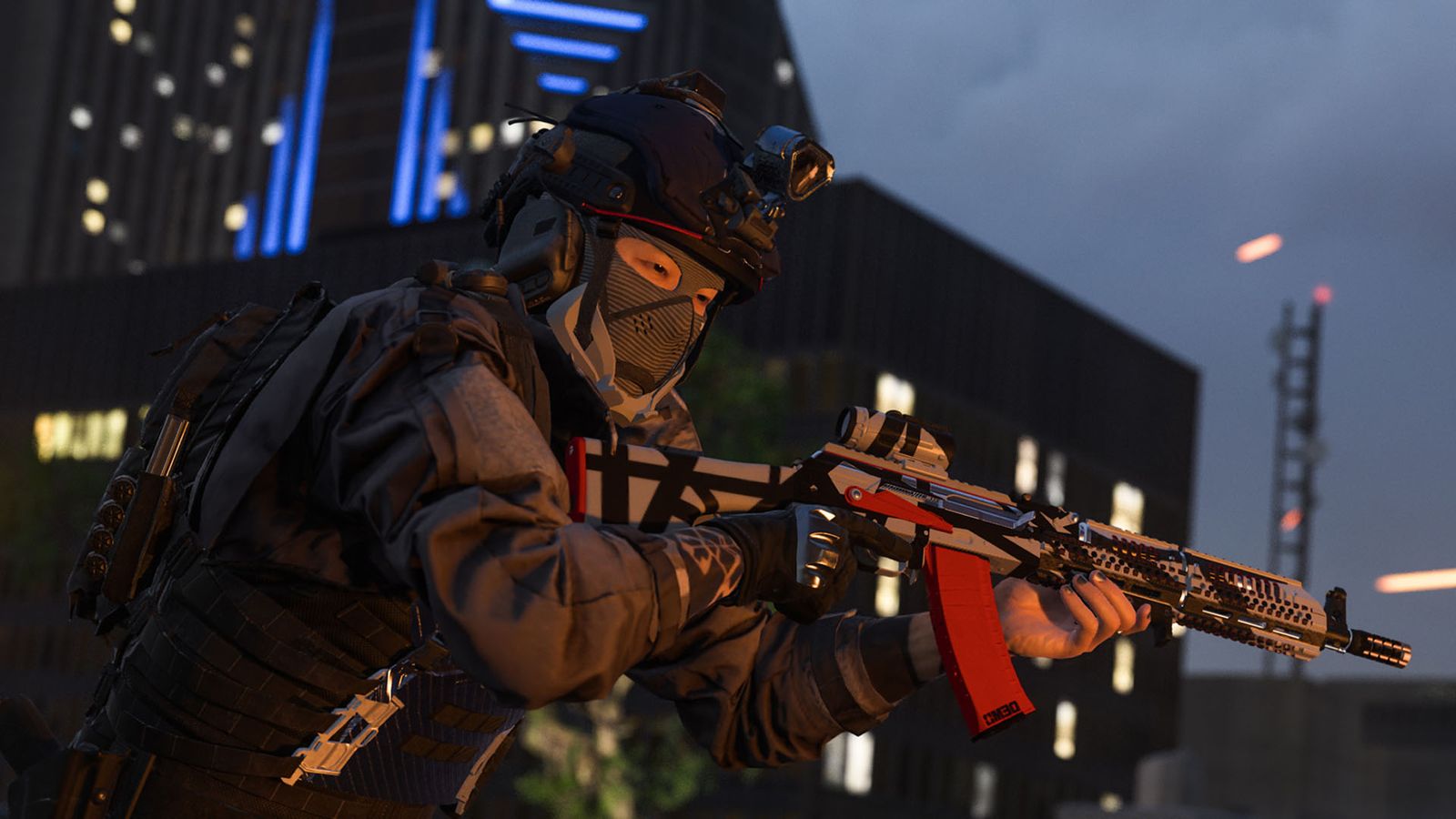 Screenshot of Warzone player holding an assault rifle in front of a dark building