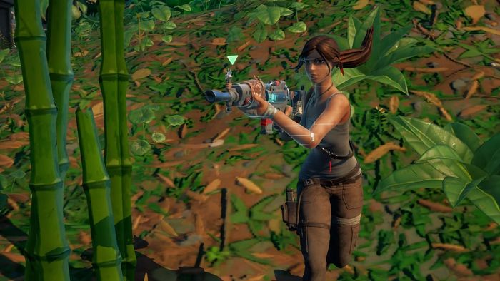 Lara Croft running with a gun in her hand.