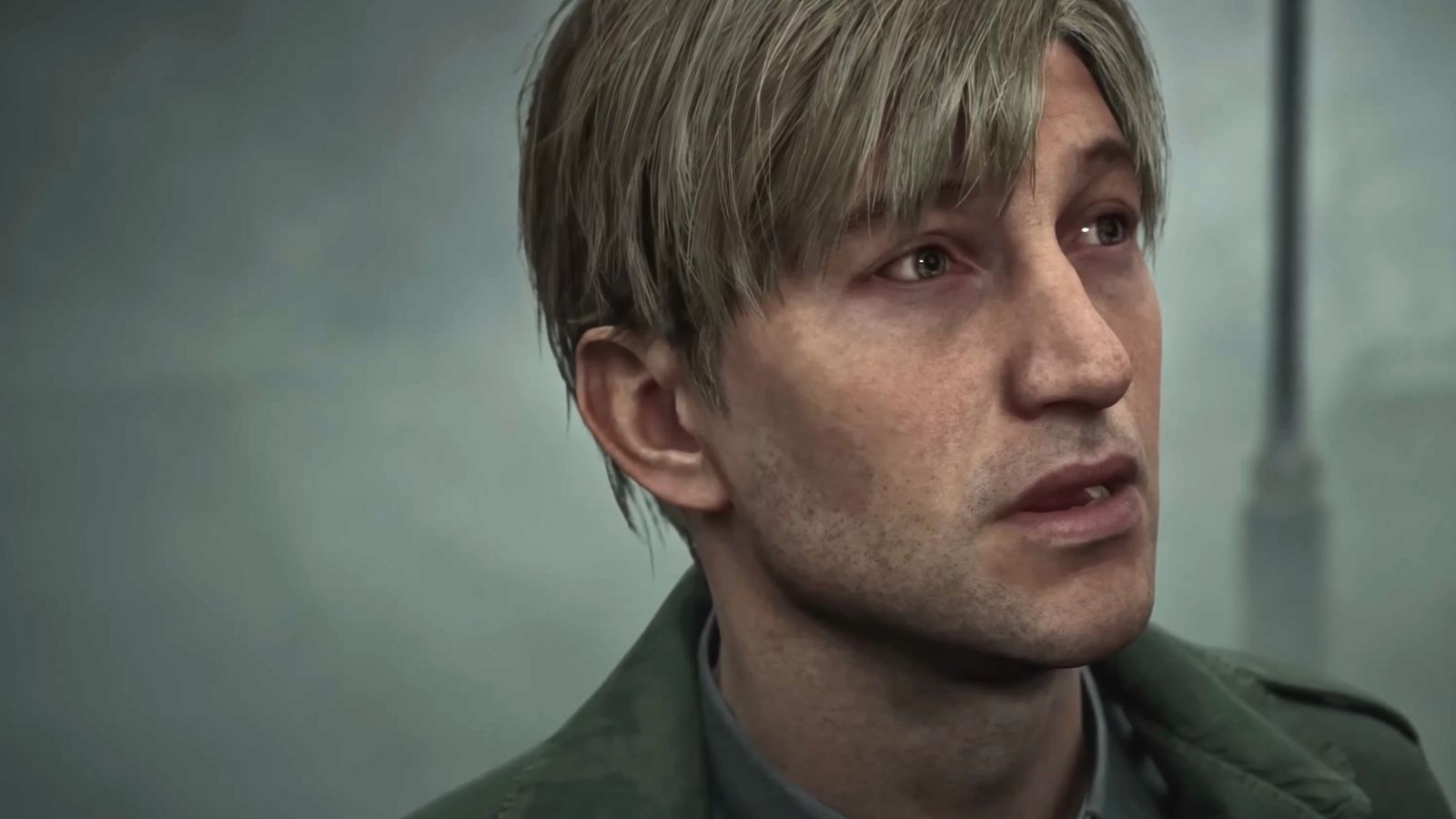 Close-up shot of James Sunderland from Silent Hill 2 Remake in the foggy streets of the titular town