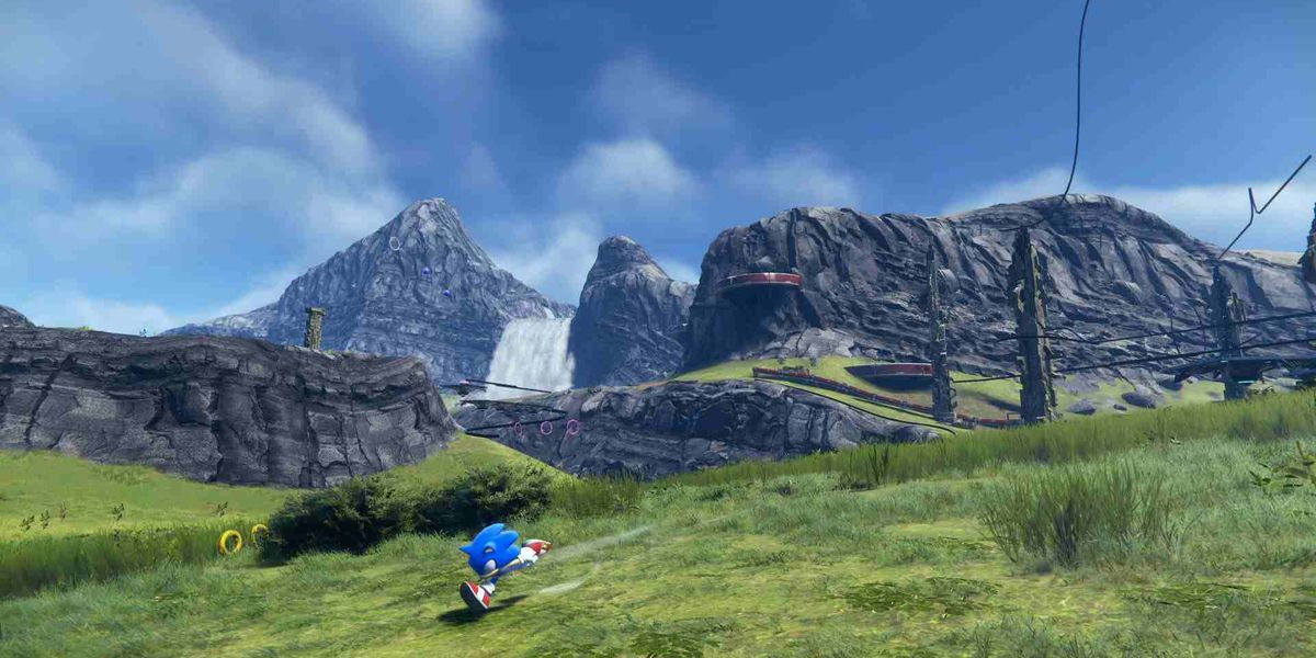 Sonic running across a grassy field in Sonic Frontiers.