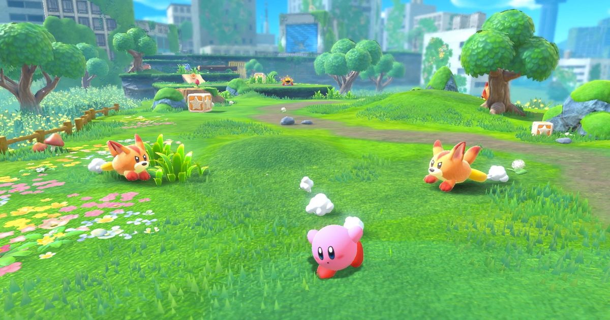 Image of Kirby running in a field in Kirby and the Forgotten Land.