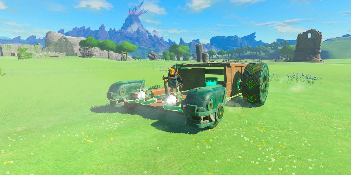 Link riding a battery-powered vehicle in Zelda Tears of the Kingdom.