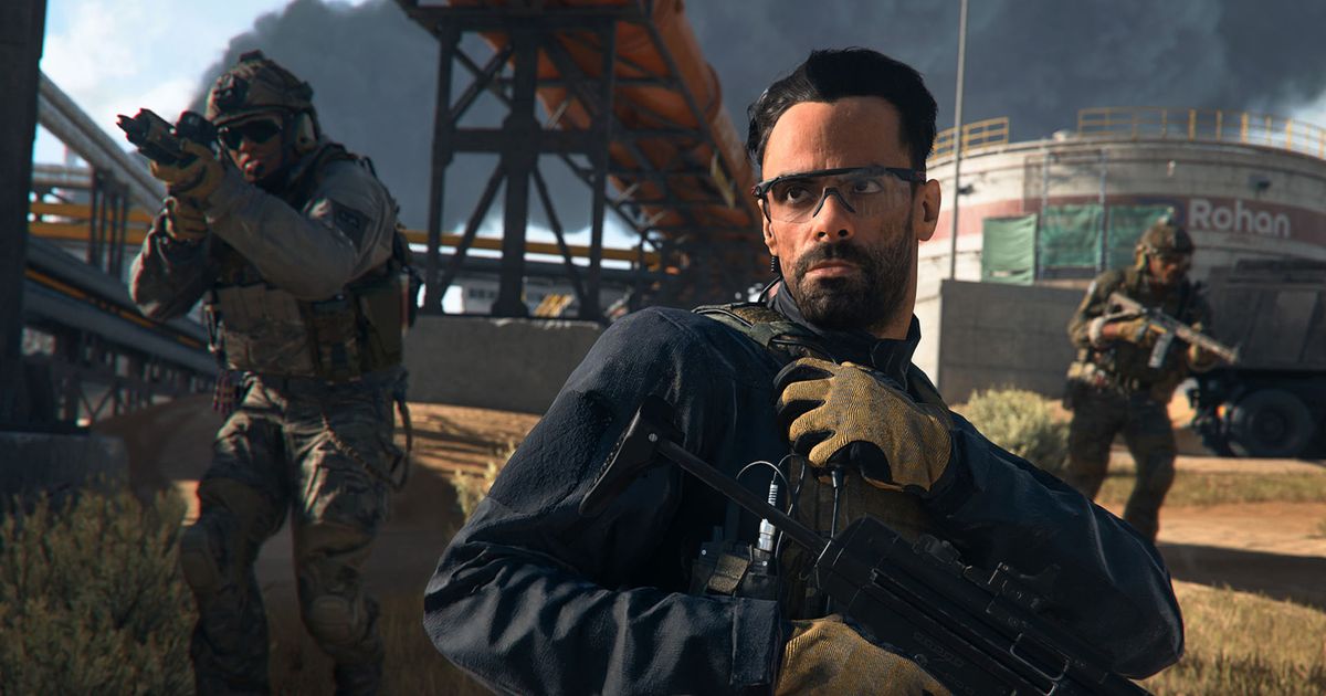 Screenshot of Modern Warfare 2 player holding vest and a submachine gun with nearby soldiers in the background