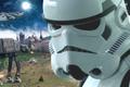 Total War: Star Wars — a stormtrooper standing in front of Empire forces firing at Rebel forces 