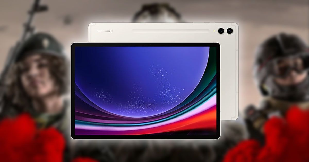 A black and cream white Samsung tablet shot from the front and back in front of a blurry image of the Warzone Mobile art featuring three soliders and red smoke.