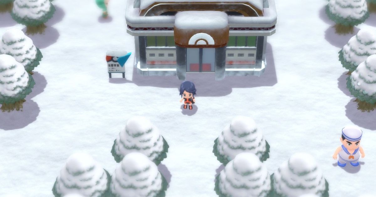 A Pokémon Trainer standing outside of Snowpoint Gym in Pokémon Brilliant Diamond and Shining Pearl.