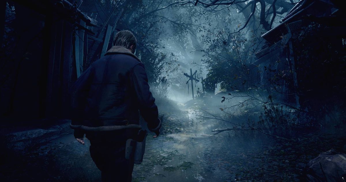 Leon walking through a dark forest in Resident Evil 4 remake.
