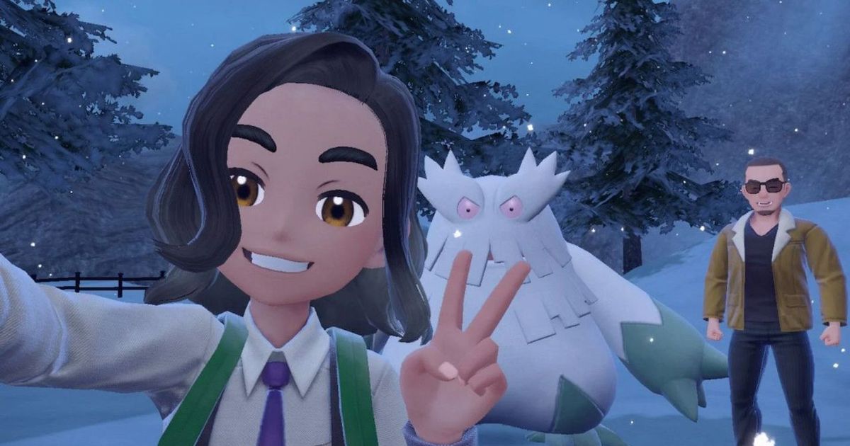Pokemon trainers taking a selfie with Abomasnow in Pokemon Scarlet and Violet.