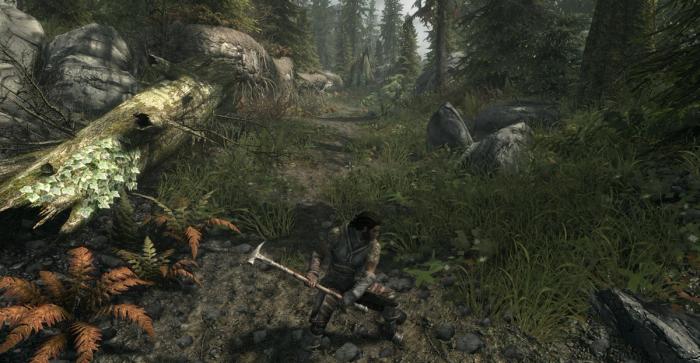 A screenshot of a Skyrim character with a warhammer.