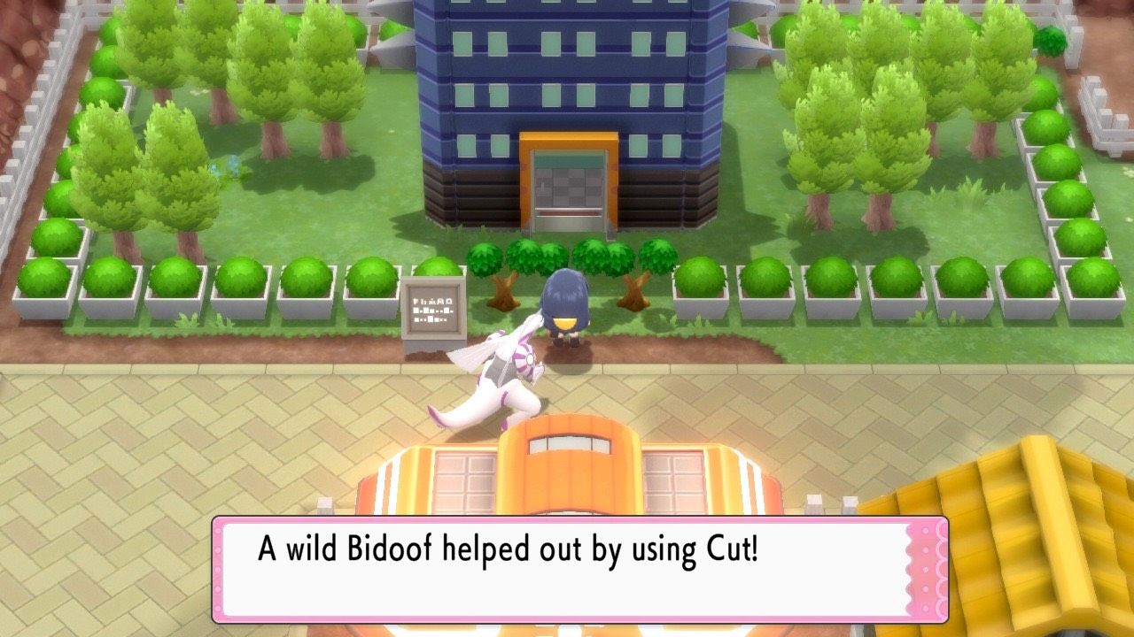 A wild Bidoof uses the Cut Hidden Move to remove a tree in front of the Team Galactic Eterna Building of Eterna City in Pokémon Brilliant Diamond and Shining Pearl.