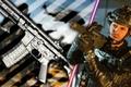 Modenr Warfare 2 platinum camo next to Modern Warfare 2 player holding gun