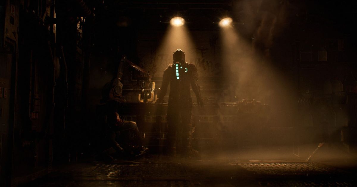 Isaac Clarke is standing in front of a desk in the Dead Space remake