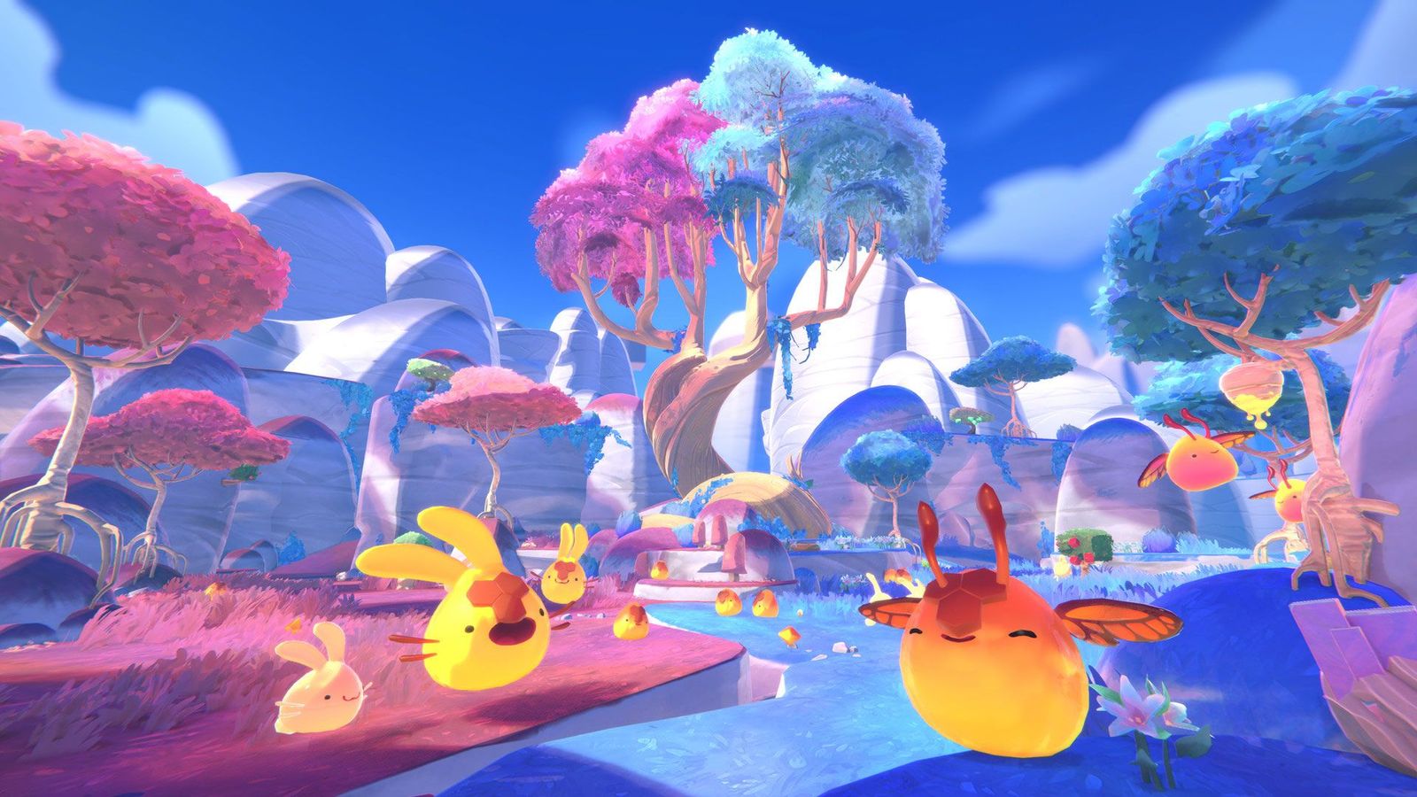 A pink and blue landscape featuring mountains and trees where in front sit a bunch of orange and yellow circular creatures.