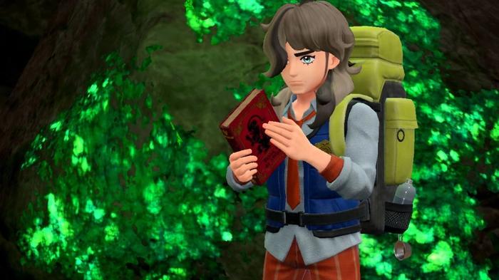 The player with a book and backpack in Pokemon Scarlet and Violet.
