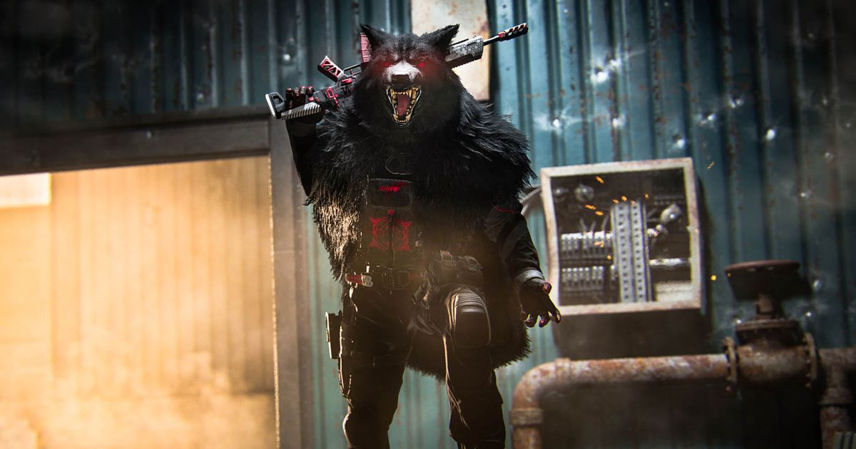 Modern Warfare 3 player holding gun on shoulder while wearing red-eyed wolf mask