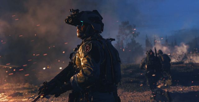 Image showing Modern Warfare 2 soldier holding gun in front of smoke