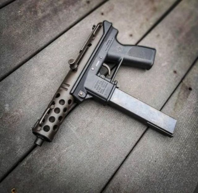 TEC-9 Pistol Placed On Wooden Floor