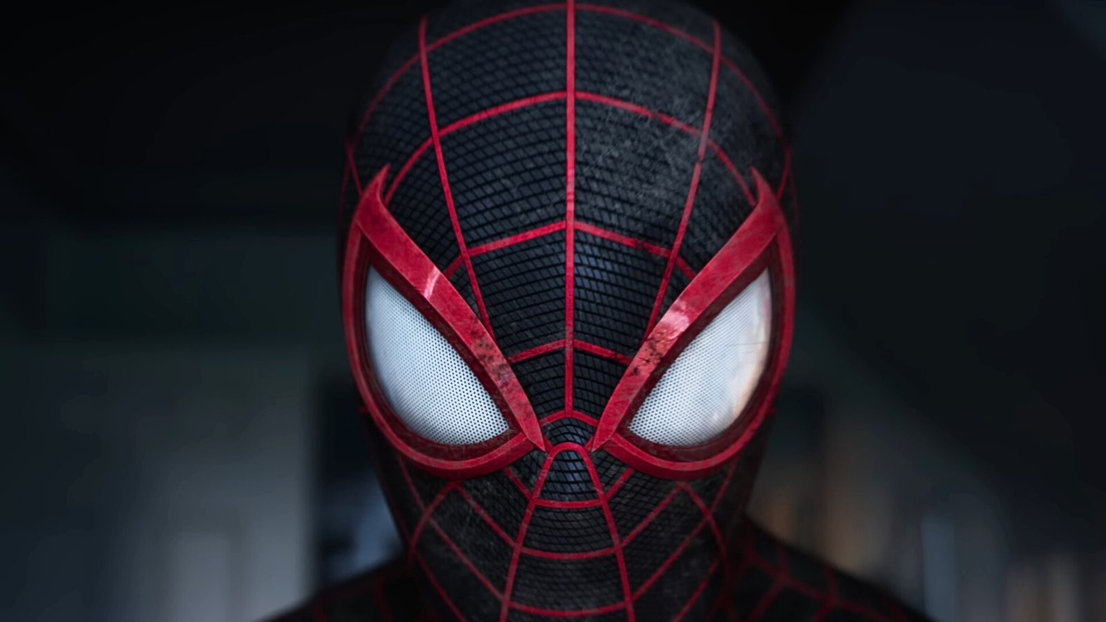 A close-up of Miles Morales in his Spider-Man mask