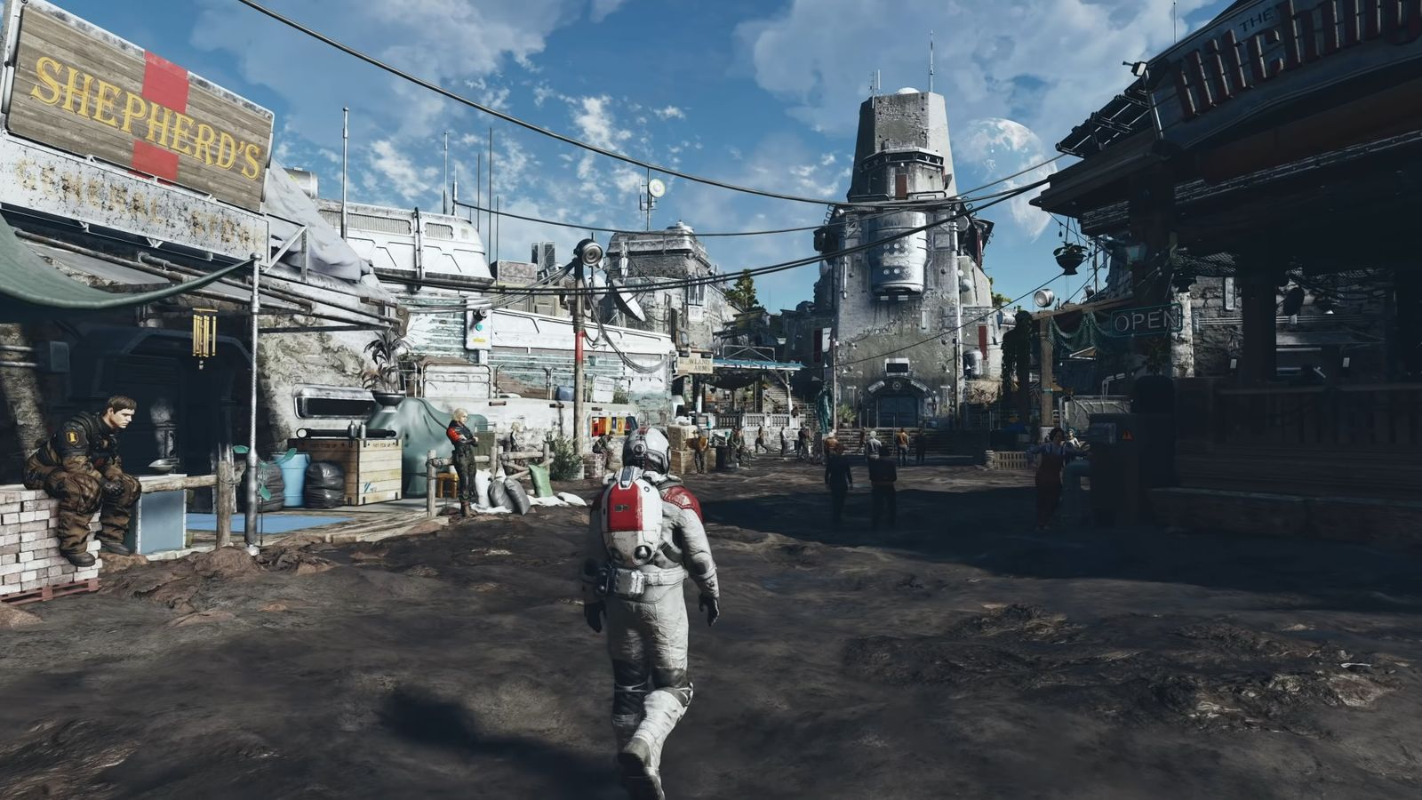 Player walking towards a town in Starfield