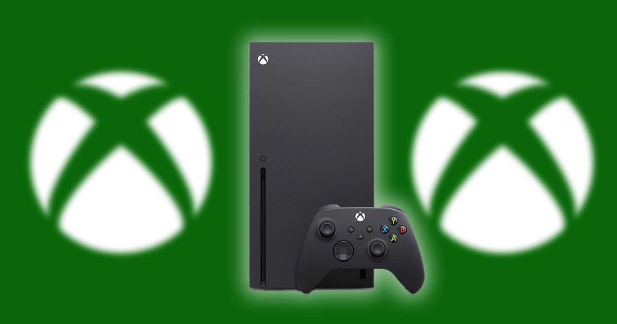 A black Xbox Series X with a controller leaning against it and blurry Xbox logos in the background.