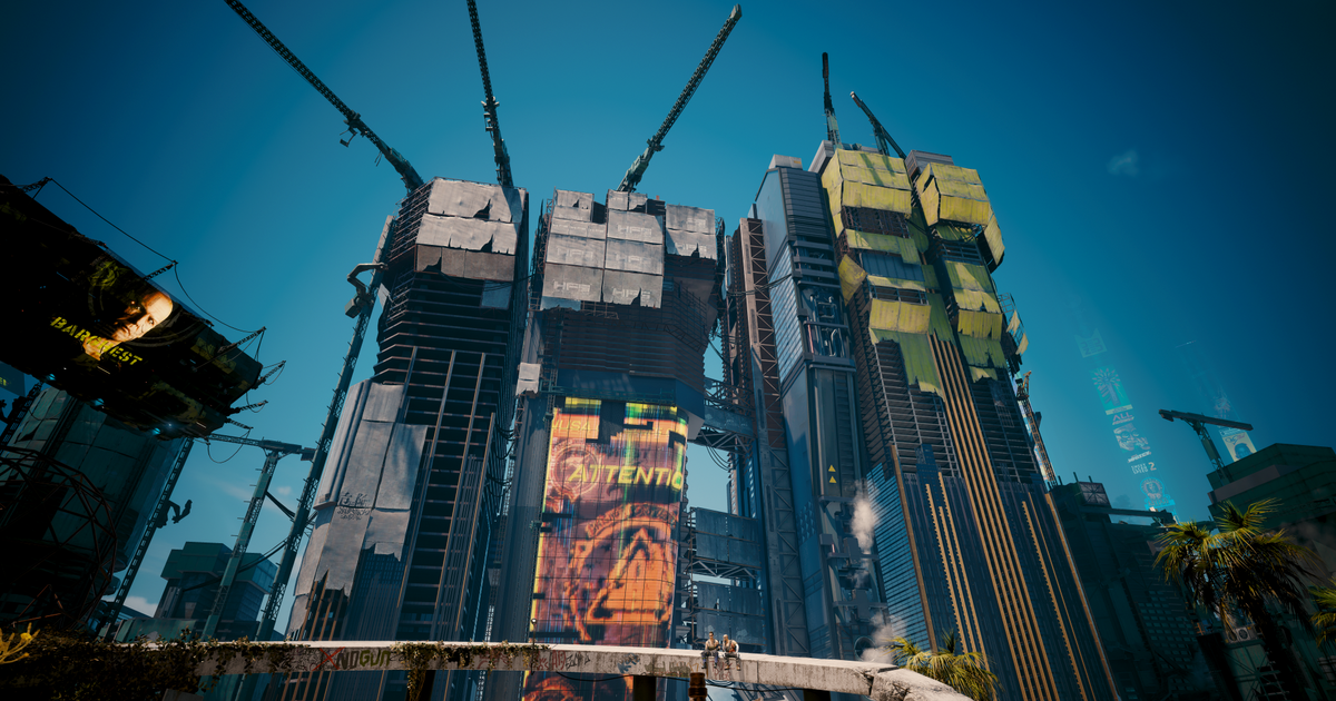 Dogtown skyscrapers, draped in Barghest propaganda, from Cyberpunk 2077: Phantom Liberty