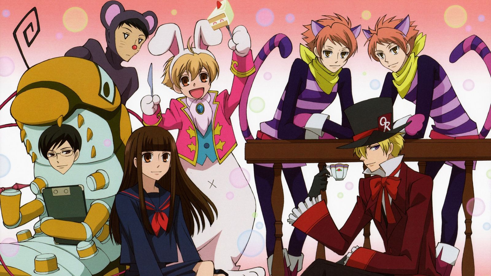 A girl is surrounded by her male friends, all in costume. 