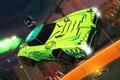A green car in Rocket League flying through the air with green smoke coming out the back of it.