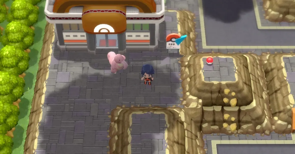 A Pokémon Trainer and their Lickitung standing outside Pastoria City Gym in Pokémon Brilliant Diamond and Shining Pearl.