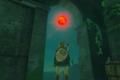 The character is looking at the red moon in Zelda: Tears of the Kingdom.