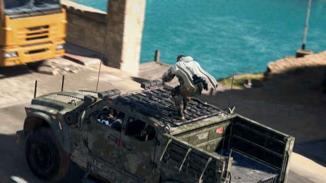 Warzone 2 player standing on vehicle roof